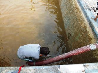 21. Čištění požární nádrže - jaro 2015